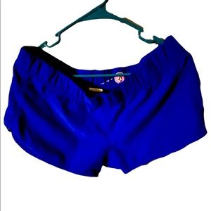 Electric blue board shorts with back pocket